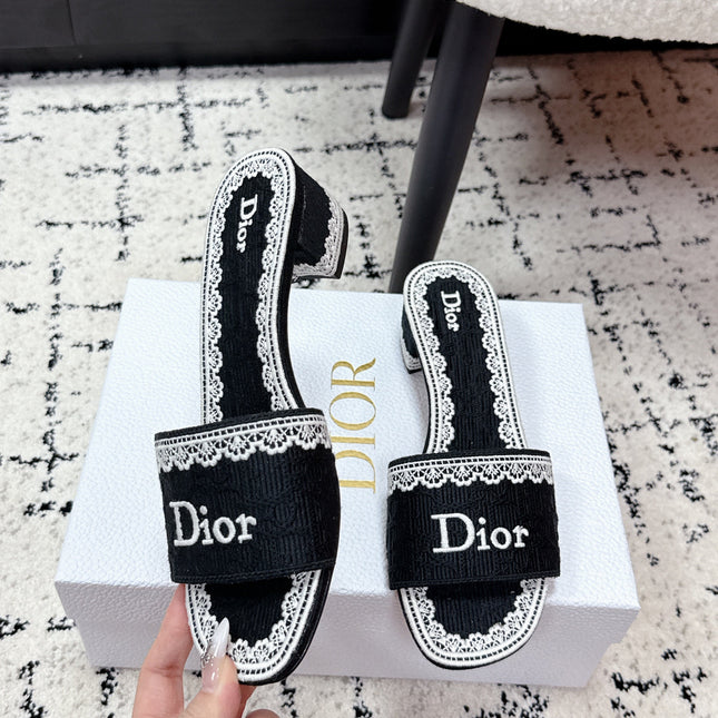 DIOR 26S HIGH HEEL SLIDES IN BLACK AND WHITE EMBOSSED OBLIQUE LACE EMBROIDERY
