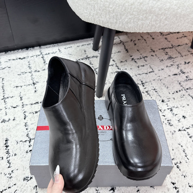 PRADA 26S SLIP ON SHOES IN BLACK SMOOTH CALFSKIN