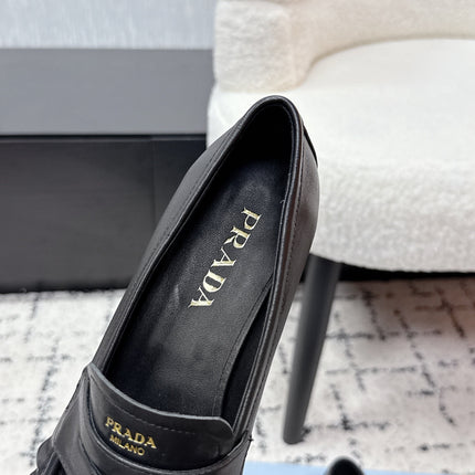 PRADA 26S LOAFERS 25MM IN BLACK CALFSKIN