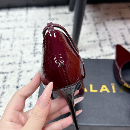 ALAIA 26S POINTED-TOE HEELS 90 MM IN DARK RED PATENT CALFSKIN
