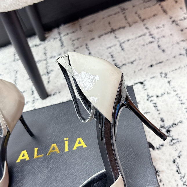 ALAIA 26S POINTED-TOE HEELS 90 MM IN LIGHT GREY PATENT CALFSKIN