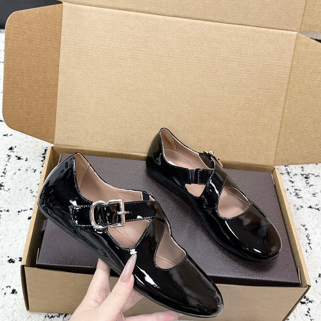 ALAIA 26S CROSS-STRAP BALLET FLATS IN BLACK GLOSSY LAMBSKIN