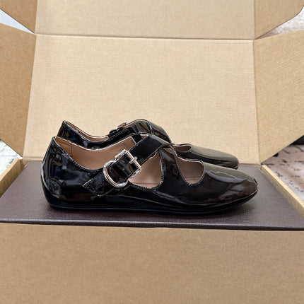 ALAIA 26S CROSS-STRAP BALLET FLATS IN BLACK GLOSSY LAMBSKIN