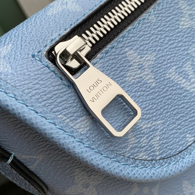 PULSE MESSENGER 22.5 IN BLUE MONOGRAM COATED CANVAS AND CALFSKIN