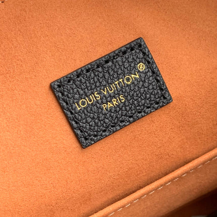 LOW KEY COOKIE MM 32 IN BLACK CALFSKIN BROWN MONOGRAM TAG
