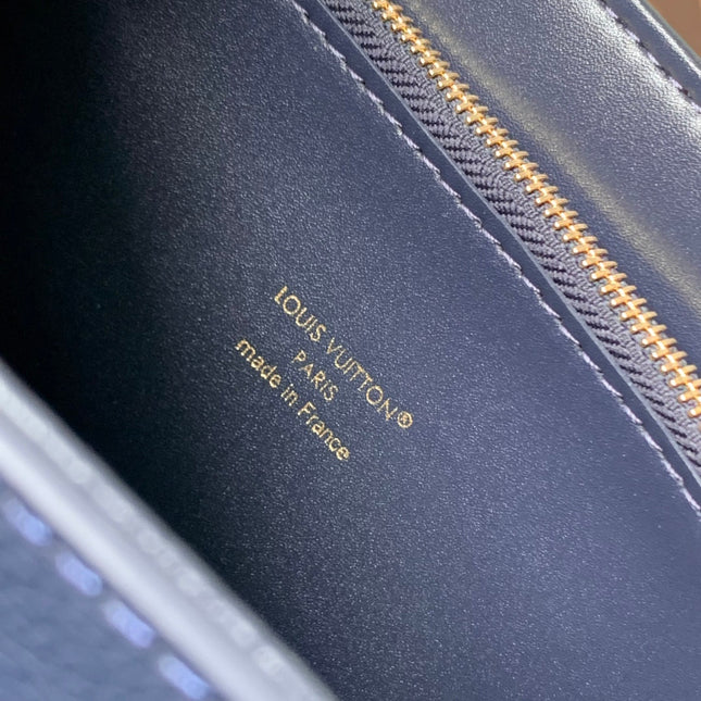 TWIST SLIM 19 IN NAVY BLUE TAURILLON CALFSKIN GOLD HARDWARE