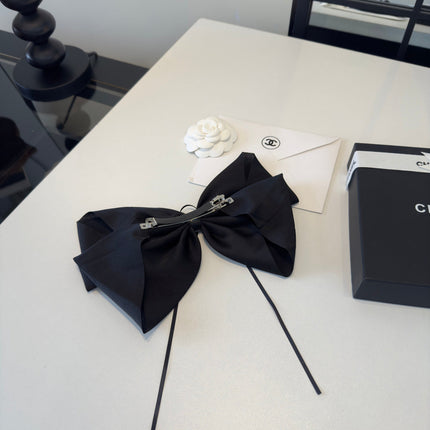 CHANEL 26S BOW HAIR CLIP IN BLACK SATIN 503133