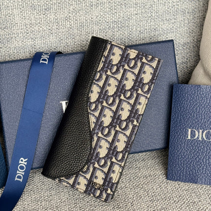 VERTICAL BIFOLD WALLET 19 IN BLACK GRAINED CALFSKIN MIX BLUE MONOGRAM OBLIQUE JACQUARD