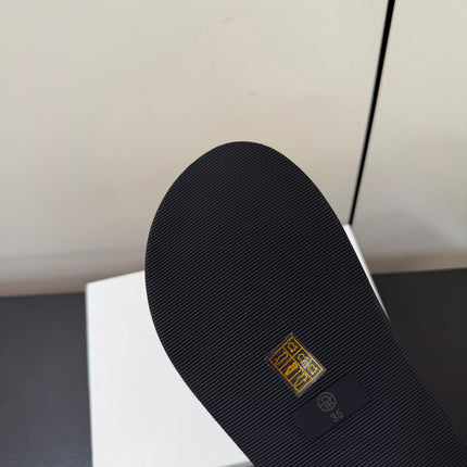 THE ROW 26S CROSS STRAP SANDALS IN BLACK CALFSKIN