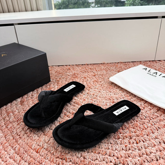 ALAIA 26S THONG SANDALS IN BLACK VELVET