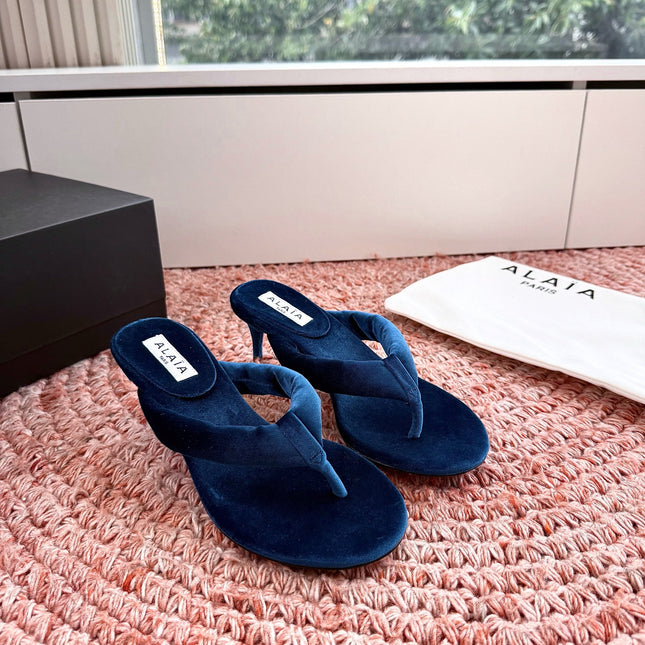 ALAIA 26S HEELED THONG SANDALS IN DARK BLUE VELVET