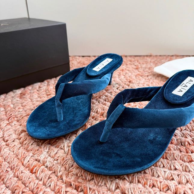 ALAIA 26S HEELED THONG SANDALS IN DARK BLUE VELVET