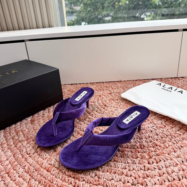 ALAIA 26S HEELED THONG SANDALS IN DARK PURPLE VELVET