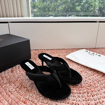 ALAIA 26S HEELED THONG SANDALS IN BLACK VELVET