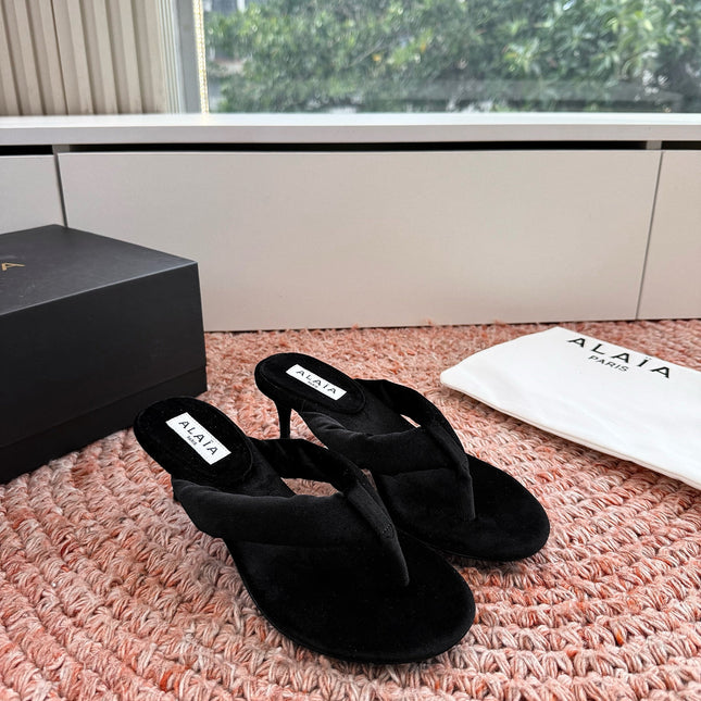 ALAIA 26S HEELED THONG SANDALS IN BLACK VELVET