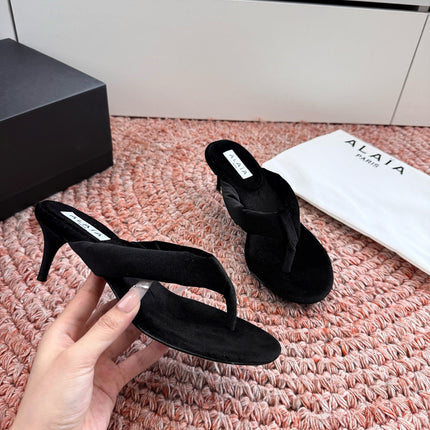 ALAIA 26S HEELED THONG SANDALS IN BLACK VELVET
