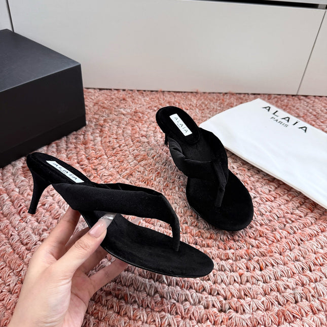 ALAIA 26S HEELED THONG SANDALS IN BLACK VELVET