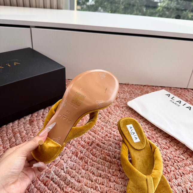 ALAIA 26S HEELED THONG SANDALS IN MUSTARD YELLOW VELVET