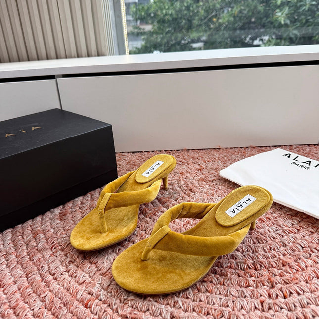 ALAIA 26S HEELED THONG SANDALS IN MUSTARD YELLOW VELVET