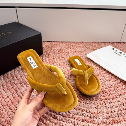 ALAIA 26S THONG SANDALS IN MUSTARD YELLOW VELVET