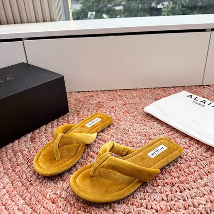 ALAIA 26S THONG SANDALS IN MUSTARD YELLOW VELVET