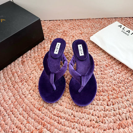 ALAIA 26S HEELED THONG SANDALS IN DARK PURPLE VELVET