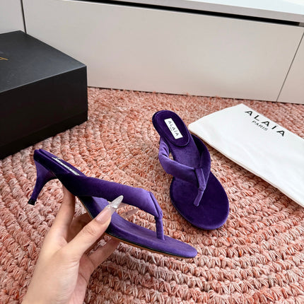 ALAIA 26S HEELED THONG SANDALS IN DARK PURPLE VELVET