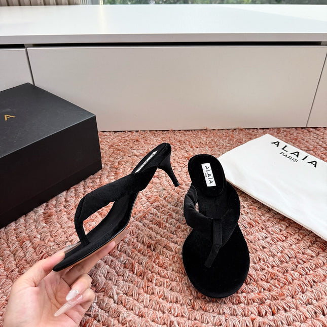 ALAIA 26S HEELED THONG SANDALS IN BLACK VELVET