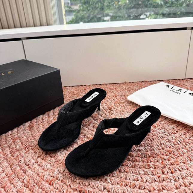 ALAIA 26S HEELED THONG SANDALS IN BLACK VELVET