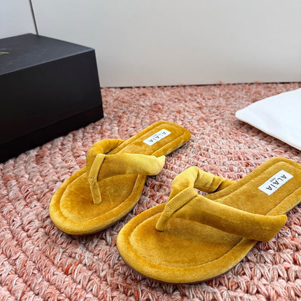 ALAIA 26S THONG SANDALS IN MUSTARD YELLOW VELVET