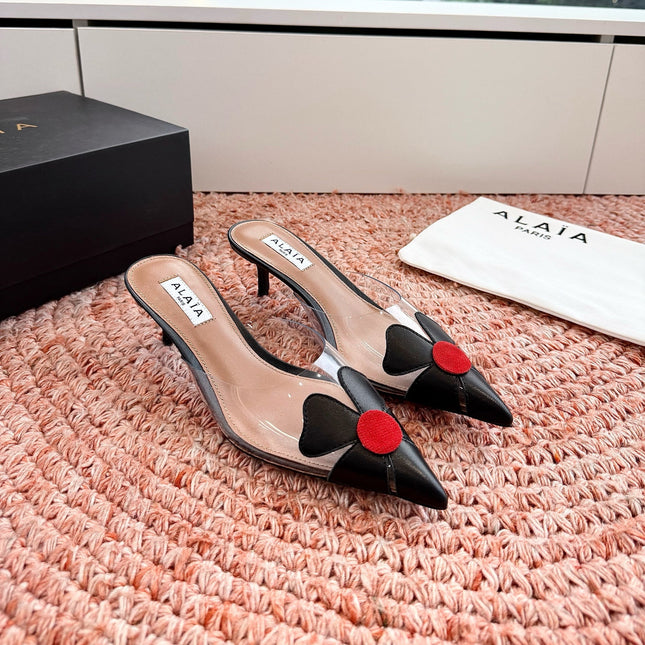 ALAIA 26S MULE HEELS IN BLACK LAMBSKIN AND TRANSPARENT PVC