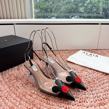 ALAIA 26S POINTED-TOE SLINGBACK HEELS IN BLACK LAMBSKIN AND TRANSPARENT PVC