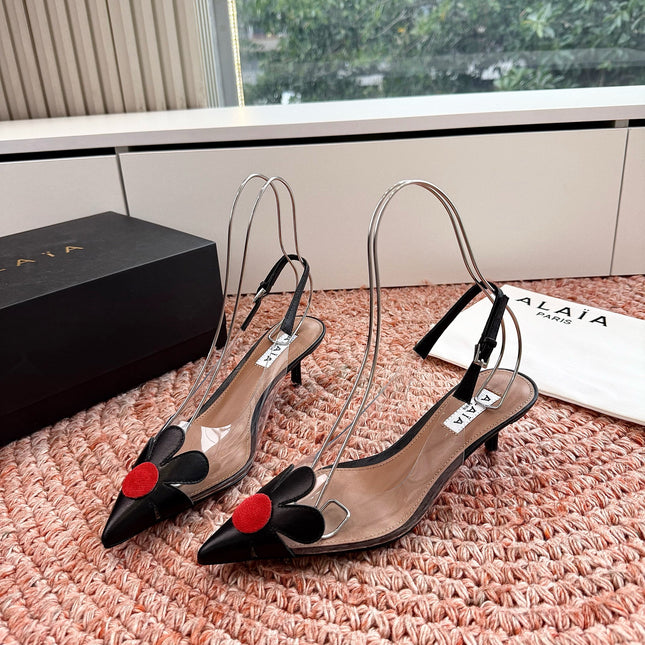 ALAIA 26S POINTED-TOE SLINGBACK HEELS IN BLACK LAMBSKIN AND TRANSPARENT PVC