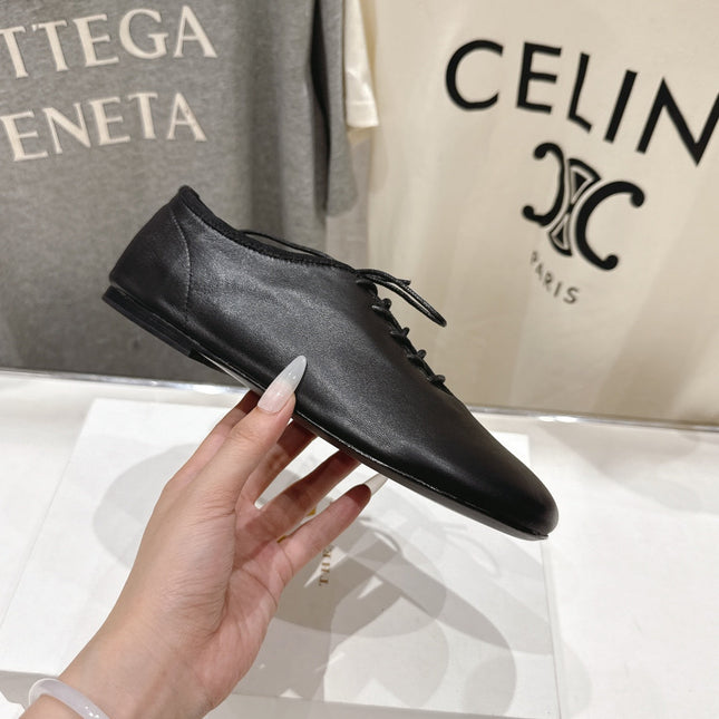 THE ROW 26S MINIMAL LACE-UP SHOES IN BLACK CALFSKIN