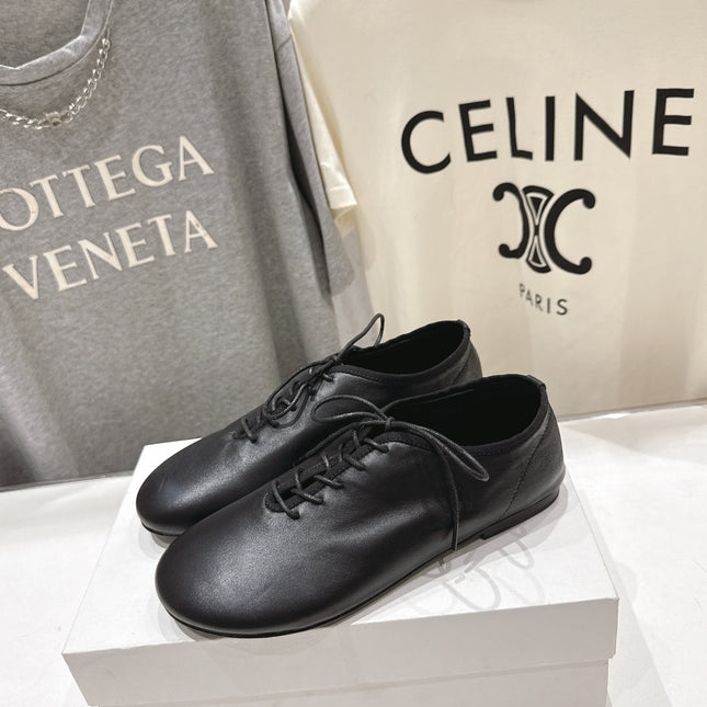 THE ROW 26S MINIMAL LACE-UP SHOES IN BLACK CALFSKIN
