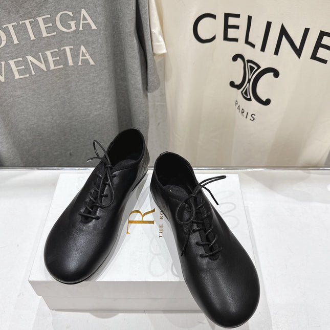 THE ROW 26S MINIMAL LACE-UP SHOES IN BLACK CALFSKIN