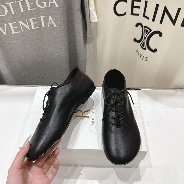 THE ROW 26S MINIMAL LACE-UP SHOES IN BLACK CALFSKIN