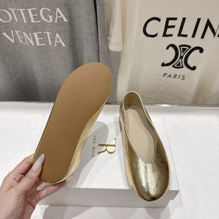 THE ROW 26S BALLET FLATS IN GOLD CALFSKIN