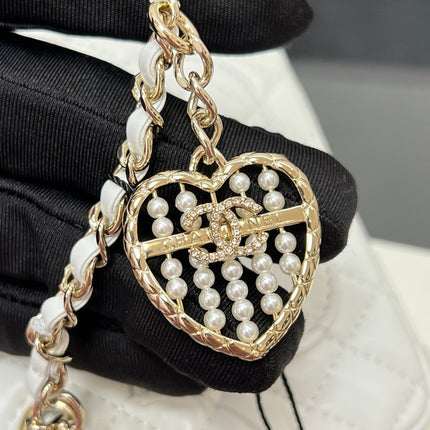 CHANEL 25S FLAP CHARM BAG 13 IN WHITE LAMBSKIN