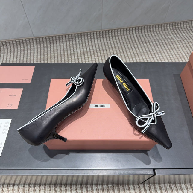 MIUMIU 26S POINTED TOE PUMPS 55MM IN BLACK AND WHITE CALFSKIN WITH BOW