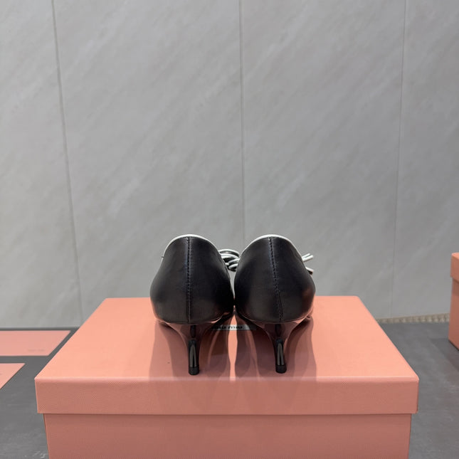 MIUMIU 26S POINTED TOE PUMPS 55MM IN BLACK AND WHITE CALFSKIN WITH BOW