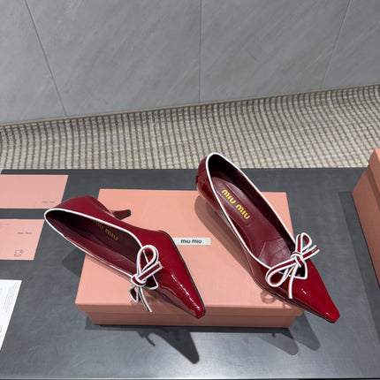 MIUMIU 26S POINTED TOE PUMPS 55MM IN DARK RED CALFSKIN WITH BOW