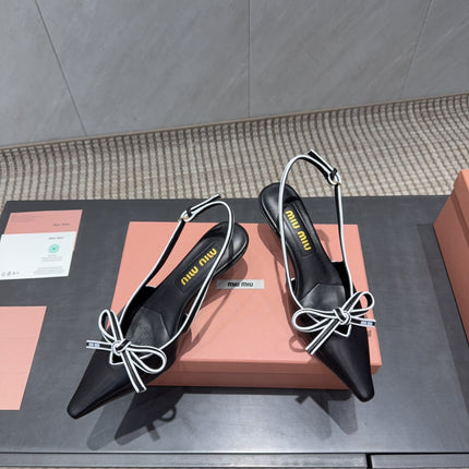 MIUMIU 26S SLINGBACK 55MM IN BLACK AND WHITE CALFSKIN WITH BOW