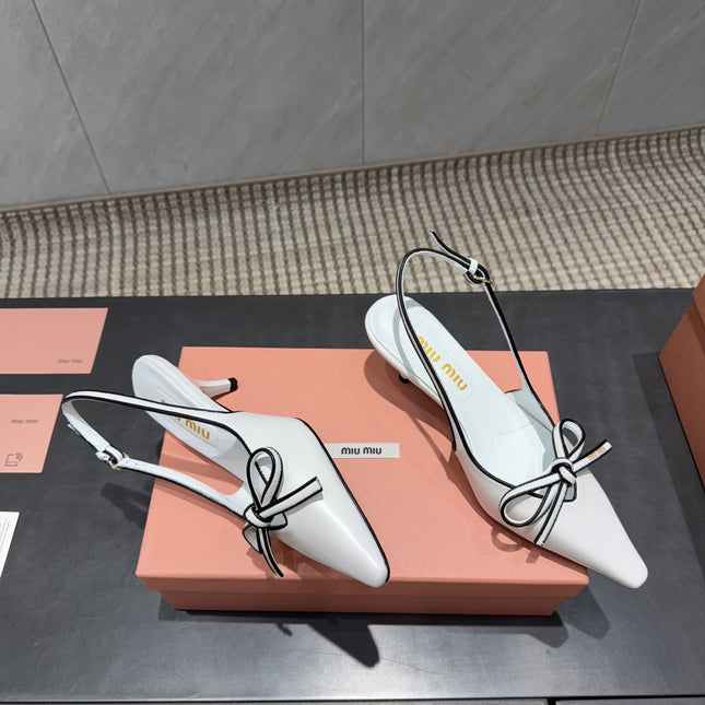 MIUMIU 26S SLINGBACK 55MM IN WHITE AND BLACK CALFSKIN WITH BOW