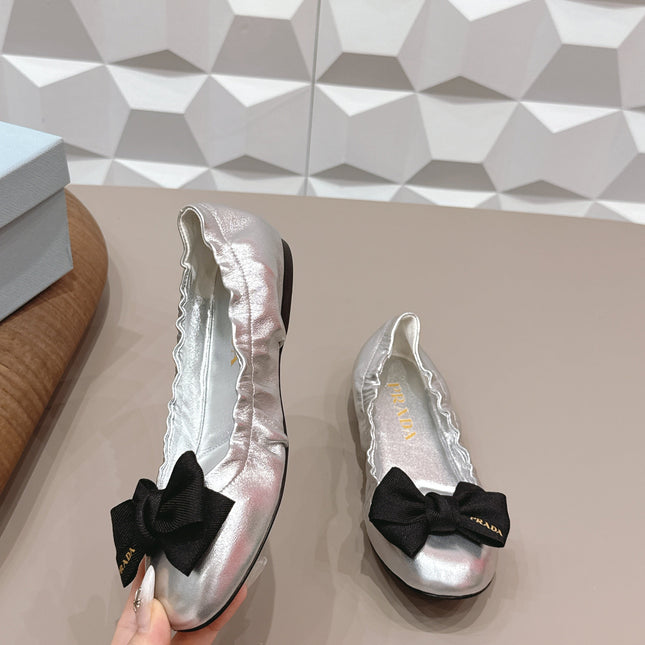 PRADA 26S ROUND TOE FLATS WITH BOW IN SILVER CALFSKIN