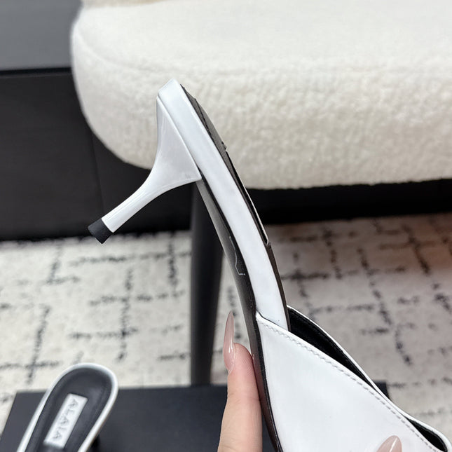 ALAIA 26S HEELED MULES 65 MM IN WHITE GLOSSY CALFSKIN