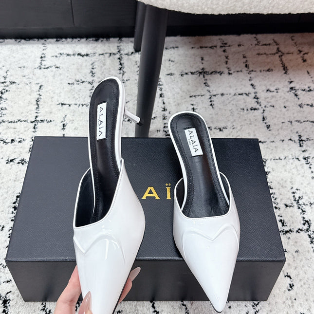 ALAIA 26S HEELED MULES 65 MM IN WHITE GLOSSY CALFSKIN