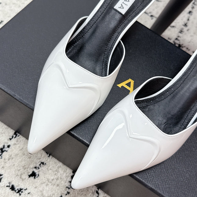 ALAIA 26S HEELED MULES 65 MM IN WHITE GLOSSY CALFSKIN