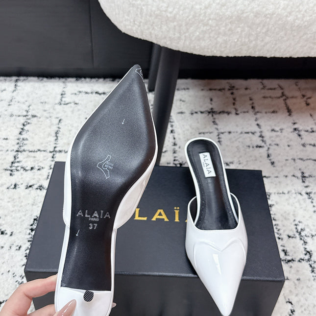 ALAIA 26S HEELED MULES 65 MM IN WHITE GLOSSY CALFSKIN