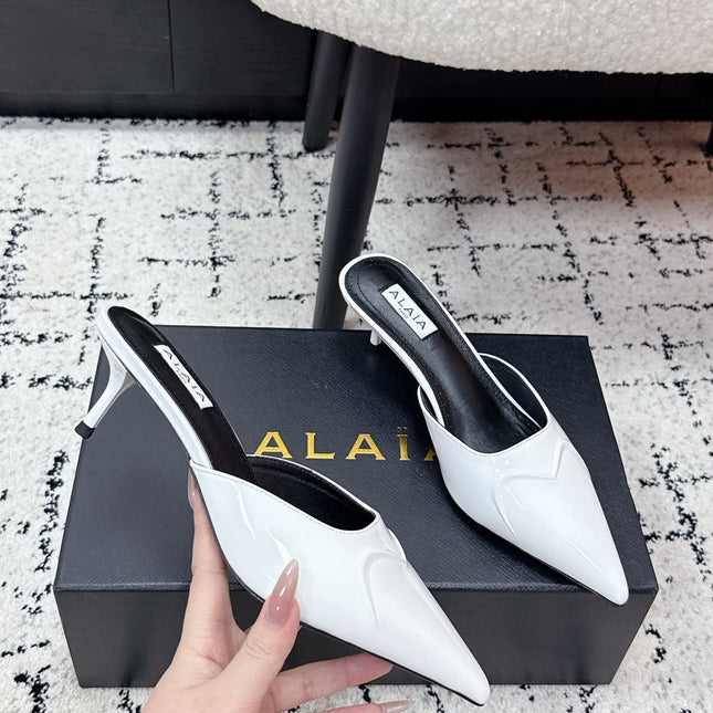 ALAIA 26S HEELED MULES 65 MM IN WHITE GLOSSY CALFSKIN